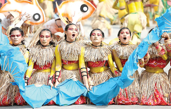 High School students from Las Piñas compete in street dancing during the city’s 11th Water Lily Festival. Residents have used the invasive aquatic species as raw materials for baskets, trays, slippers, and other functional and ornamental items. PHOTO BY RUSSELL PALMA 