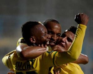 Mamelodi Sundowns players celebrate after scoring against Zamalek during their African Champions League group stage match, at Petro Sport stadium in Cairo, Egypt, on July 17. AFP PHOTO