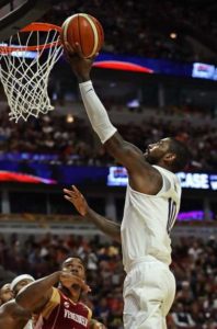 Kyrie Irving No.10 of the United States puts up a shot against Venezuela during pre-Olympic exhibition game at United Center on Saturday in Chicago, Illinois. AFP PHOTO