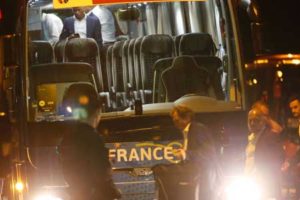 Police secure the area as French players arrive at the hotel Molitor on Monday in Saint-Denis following their Euro 2016 final match against Portugal. AFP PHOTO