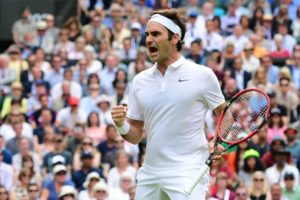 Switzerland’s Roger Federer celebrates a point against US Steve Johnson during their men’s singles fourth round match on the eighth day of the 2016 Wimbledon Championships at The All England Lawn Tennis Club in Wimbledon, southwest London, on Tuesday. AFP PHOTO
