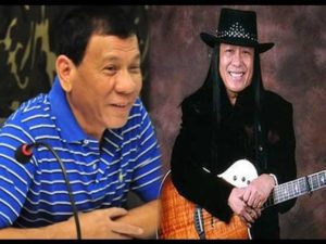  The President and his new NCCA Chairman Freddie Aguilar  PHOTO FROM YOUTUBE