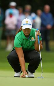 South Korea’s Mirim Lee lines up a putt on the 16th green on the first day of the 2016 Women’s British Open Golf Championships at Woburn Golf Club in central England, on Friday.  AFP PHOTO 