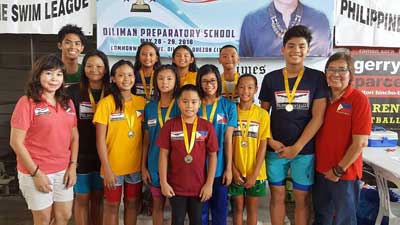  Philippine Swimming League (PSL) President Susan Papa (far right) and Secretary General Maria Susan Benasa (far left) with the record-breakers in the Philippine Swimming League (PSL)97th National Series - Top 16 Swimming Championship held at the Diliman College swimming pool in Quezon City.  CONTRIBUTED PHOTO