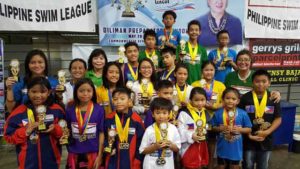 The Most Outstanding Swimmer (MOS) awardees in Novice Division pose with Philippine Swimming League Secretary General Maria Susan Benasa and President Susan Papa during the awarding ceremony of the 99th PSL National Series.  CONTRIBUTED PHOTO