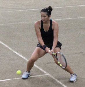 Anna Christine Patrimonio delivers a backhand during a match. CONTRIBUTED PHOTO 