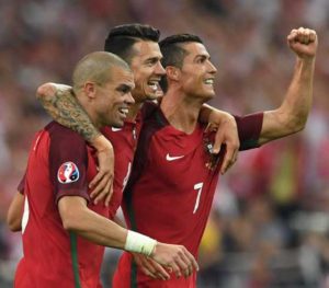 Portugal’s defender Pepe, Portugal’s defender Fonte and Portugal’s forward Cristiano Ronaldo celebrate after winning the Euro 2016 quarterfinals football match between Poland and Portugal at the Stade Velodrome in Marseille on Friday. AFP PHOTO