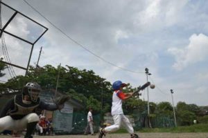 Members of the Smokey Mountain baseball team during practice at the former dumpsite in Manila. Inspired by a Hollywood film starring Kevin Costner about a farmer who builds a baseball diamond on his cornfield, Manila’s huge landfill nicknamed Smokey Mountain has its own “Field of Dreams” to stop its youth going astray. AFP PHOTO