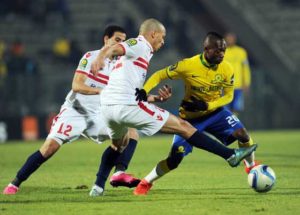 Khama Billiat (right) of Sundowns vies with Ibrahim Sayed and Mohamed Tolba of Zamalek during the CAF2016 Champions league match between Zamalek and Mamelodi Sundown at Lucas Moripe Stadium on Thursday in Pretoria.  AFP PHOTO