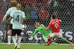 Wales’ forward Hal Robson-Kanu (right) scores a goal during the Euro 2016 quarterfinals football match between Wales and Belgium at the Pierre-Mauroy stadium in Villeneuve-d’Ascq near Lille, on Saturday.  AFP PHOTO