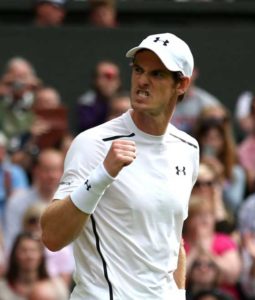Britain’s Andy Murray celebrates after beating Taiwan’s Lu Yen-hsun during their men’s singles second round match on the fourth day of the 2016 Wimbledon Championships at The All England Lawn Tennis Club in Wimbledon, southwest London, on Friday. AFP PHOTO 