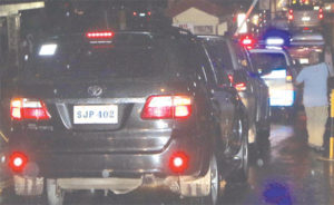 Former President Gloria MacapagalArroyo’s convoy arrives at her La Vista Homes village in Quezon City from the Veterans Memorial Medical Center. PHOTO BY BOB DUNGO