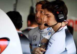 McLaren Honda’s British driver Jenson Button gets ready in the garage for the first practise session of the Formula One German Grand Prix at the Hockenheim circuit on Saturday. AFP PHOTO