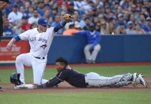 Jose Ramirez  (No. 11) of the Cleveland Indians advances from second base to third base in the fourth inning during MLB game action as Josh Donaldson (No. 20) of the Toronto Blue Jays waits for the ball at Rogers Centre in Toronto in Ontario, Canada. AFP PHOTO
