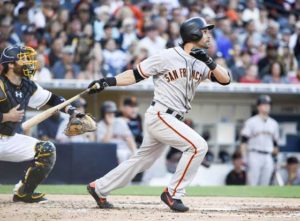 Angel Pagan of the San Francisco Giants hits a two-run home run during the third inning of a baseball game against the San Diego Padres at PETCO Park in San Diego, California.  AFP PHOTO