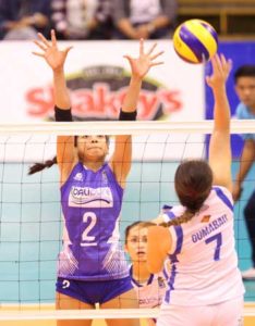 Pocari Sweat’s Michele Gumabao (No. 7) goes for a kill against BaliPure’s Alyssa Valdez during their sudden death for the second finals berth in the Shakey’s V-League Season 13 Open Conference. CONTRIBUTED PHOTO