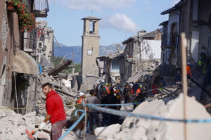 IN RUINS Rescuers and firemen inspect the rubble of buildings in Amatrice on August 24 after a powerful earthquake rocked central Italy. The earthquake left 38 people dead and the total is likely to rise, the country’s civil protection unit said in the first official death toll. Scores of buildings were reduced to dusty piles of masonry in communities close to the epicenter of the pre-dawn quake in a remote area straddling the regions of Umbria, Marche and Lazio. AFP PHOTO BY FILIPPO MONTEFORTE 