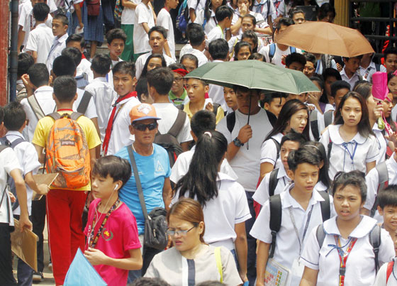 Students of Batasan Hills National High School leave their campus at noon so that those in the afternoon shift can start their classes. Following tradition, the Education department got the biggest allocation for 2017 – P571 billion—which is 30 percent more than this year’s budget. PHOTO BY MIKE DE JUAN 