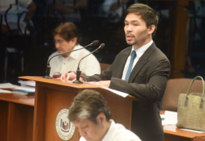 FOR DEATH Senator Manny Pacquiao defends his stand backing the reimposition of the death penalty in his first privilege speech at the Senate. PHOTO BY BOB DUNGO 