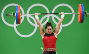 NEW SPORTS HERO The Philippines’ Hidilyn Diaz competes during the women’s 53kg weightlifting event at the Rio 2016 Olympic games in Rio de Janeiro on August 7 (August 8 in Manila). AFP PHOTO / GOH Chai Hin 