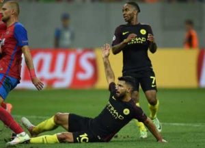 Sergio Aguero (center) of Manchester City celebrates a goal during the UEFA Champions league first leg play-off football match between Steaua Bucharest and Manchester City at the National Arena stadium in Bucharest on Wednesday. AFP PHOTO