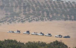 PROTECTING THE BORDER This picture taken from the Turkish Syrian border city of Karkamis in the southern region of Gaziantep, on Wednesday shows pro-Ankara Syrian opposition fighters moving two kilometers west from the Syrian Turkish border town of Jarabulus. Turkey’s army backed by international coalition air strikes launched an operation involving fighter jets and elite ground troops to drive Islamic State jihadists out of a key Syrian border town. Turkey’s state-run Anadolu news agency reported that pro-Ankara Free Syrian Army (FSA) rebels had already penetrated three kilometers (two miles) inside Syria towards the IS-held town of Jarabulus. The air and ground operation, the most ambitious launched by Turkey in the Syria conflict, is aimed at clearing jihadists from the town of Jarabulus, which lies directly opposite the Turkish town of Karkamis. AFP PHOTO