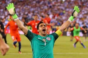 Chile goalkeeper Claudio Bravo celebrates after defeating Argentina to win the Copa America Centenario Championship on June 26, 2016. AFP PHOTO