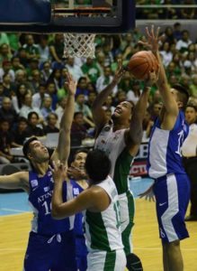 Jason Perkins (10) of DLSU Scores a basket against Ateneo defenders Alfonso Gotladera (16) and Gideon Bibilonio (18) during the UAAP Season 78 last year at the Smart Araneta Coliseum. PHOTO BY RUSSELL PALMA