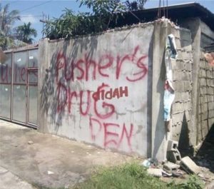 MARKED One of the houses abandoned by Muslims in Barangay Bonuan Gueset in Dagupan City was spray-painted with the words “drug den” PHOTO BY JAIME G. AQUINO