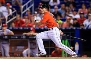 Derek Dietrich of the Miami Marlins hits a walk-off triple during the ninth inning of the game against the St. Louis Cardinals at Marlins Park in Miami, Florida. AFP PHOTO