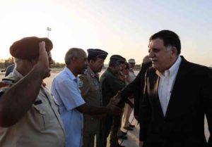 STRIKING BACK AT ISLAMIC STATE A handout picture released by the media center of the Government of National Accord (GNA) on Monday shows Libyan Prime Minister Fayez al-Sarraj (R) arriving in Misrata to visit the headquarters of the military command operation to retake Sirte, an Islamic State bastion east of the capital. AFP PHOTO