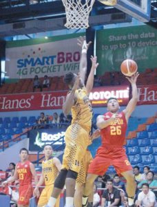 Mapua’s Carlos Isit (26) tries to shoot past Jose Rizal University’s AbdulWahab, AbdulRazak (10) during an NCAA men’s basketball game at the San Juan Arena. PHOTO BY  CARMELA ENRIQUEZ 