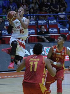 Davon Potts of San Beda College drives on Mckevin Johnson and Jayson David of San Sebastian College-Recoletos during an NCAA season 92 men’s basketball game at the San Juan Arena on Friday. PHOTO BY BOB DUNGO JR. 