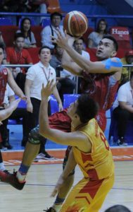 Lyceum University of the Philippines’ Mark Malabanan drives on Justine Mercado of San Sebastian College during an NCAA season 92 game at the San Juan Arena. PHOTO BY BOB DUNGO JR.