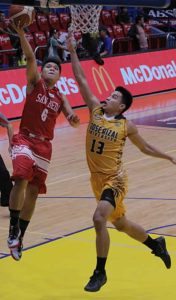 San Beda’s Gio Lasquety drives on Jomari Presibitero of Jose Rizal University during an NCAA men’s basketball game at the San Juan Arena. PHOTO BY BOB DUNGO JR.