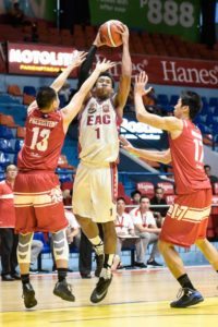 EAC’s Sidney Onwubere drives on Raniel Navarro and Jomari Presibitero of San Beda during an NCAA Season 92 men’s basketball game at The Arena in San Juan City on Friday.  CONTRIBUTED PHOTO 