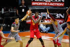 Allwell Oraeme of MIT defends the ball against Lyceum’s Wilson Baltazar (6) and Jesper Ayaay during an NCAA Season 92 baskeball game at the San Juan Arena on Tuesday. PHOTO BY DJ DIOSINA