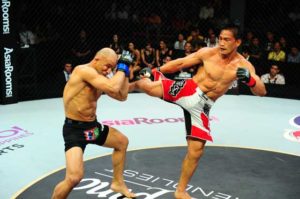 Eduard Folayang  (right) delivers a kick against an opponent. CONTRIBUTED PHOTO 