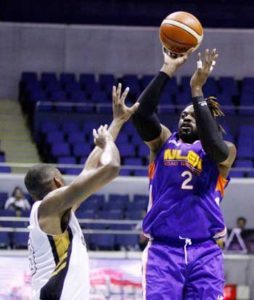 Henry Walker of the NLEX Road Warriors fires a shot against James White of the Mahindra Enforcers during a PBA Governor’s Cup game at the Araneta Coliseum on Wednesday. CONTRIBUTED PHOTO