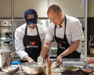  Chefs Alexander Tanco and Dino Dela Paz conduct a cooking demo using one of the store’s fully functional kitchen showcases