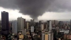 TORNADO This video grab from the Twitter account of Karen Madrigal shows a tornado sweeping across Manila from the Port Area before 5 p.m. on Sunday. Madrigal took the video from a condominium in Binondo district.