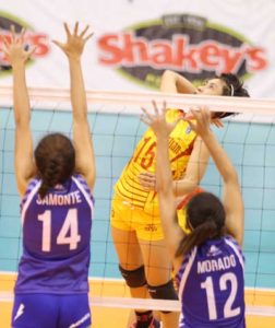 SSC’s Dangie Encarnacion (15) goes for a kill against Ateneo’s Julianne Samonte and Melissa Morado during their Shakey’s VLeague Collegiate Conference duel at the Philsports Arena. CONTRIBUTED PHOTO