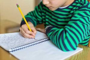 Writing down important points can help kids ace their tests