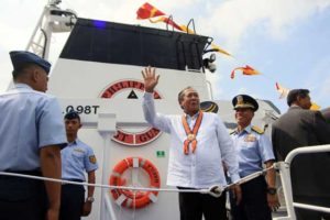 NEW VESSEL Transportation Secretary Arthur Tugade (second from right) waves as he inspects the first of 10 new Coast Guard vessels donated by Japan. The vessel arrived on Thursday. PHOTO BY BOB DUNGO JR.