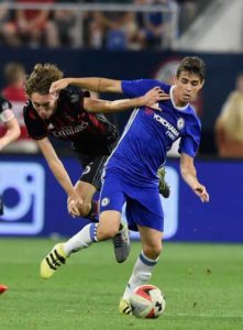 Oscar No.8 of Chelsea controls the ball against Niccolo Zanellato No.45 of AC Milan during the second half of the International Champions Cup match on Thursday at U.S. Bank Stadium in Minneapolis, Minnesota. AFP PHOT