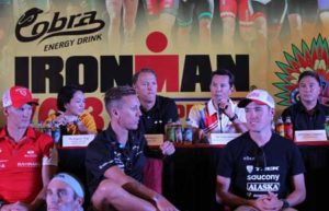 Wilfred Uytengsu (back row, second from right), founder of the organizing Sunrise Events, Inc., discusses the mechanics of the Cobra Energy Drink Ironman 70.3 Asia-Pacific Championship presented by Ford during the press launch at Shangri-La Mactan’s The Marquee in Cebu late Friday. Others gracing the event firing off today (Sunday), the first-ever Ironman As-Pac held for the first time out of Australia and New Zealand, are (from left) Asia Brewery Category manager Angelie Ong, World Triathlon Corp.’s Geoff Meyer and lawyer Mark Tolentino. CONTRIBUTED PHOTO