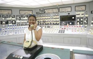 HELLO Senator Nancy Binay tries to use a telephone inside the three-decade-old Bataan Nuclear Power Plant. Senators inspected the mothballed plant on Friday amid proposals to rehabilitate it to provide additional power supply to Luzon. PHOTO BY RENE DILAN