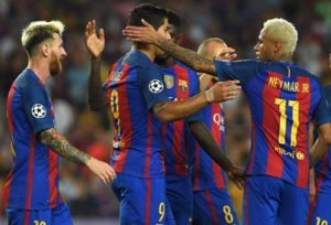 Barcelona’s Uruguayan forward Luis Suarez (center) is congratulated by Barcelona’s Brazilian forward Neymar (right) and Barcelona’s Argentinian forward Lionel Messi (L) after scoring a goal during the UEFA Champions League football match FC Barcelona vs Celtic FC at the Camp Nou stadium in Barcelona on Wednesday. AFP PHOTO