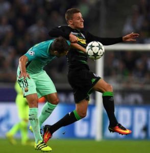  Moenchengladbach’s Belgian midfielder Thorgan Hazard (right) and Barcelona’s defender Jordi Alba vie for the ball during the UEFA Champions League first-leg group C football match between Borussia Moenchengladbach and FC Barcelona at the Borussia Park in Moenchengladbach, western Germany on Thursday. AFP PHOTO