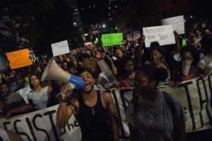 Hundreds of protesters were out again on Friday in Charlotte, North Carolina night calling for the release of the videos amid a greater presence of National Guard troops, but the atmosphere was calmer than during previous days. AFP PHOTO
